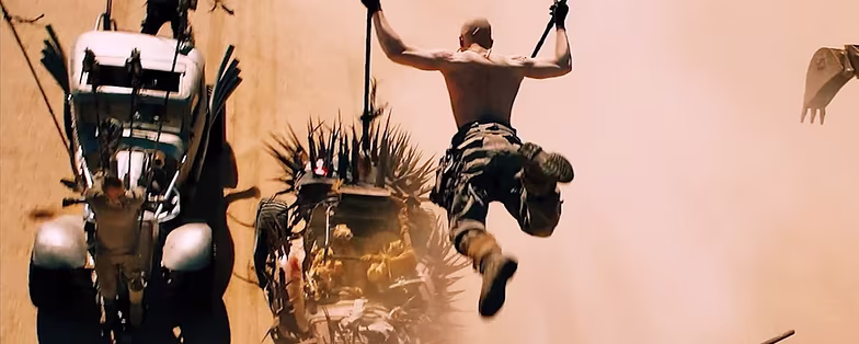mad-max-fury-road-jumping-to-car-wallpaper